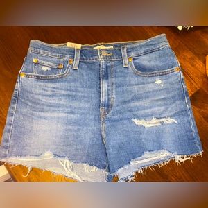 Pair of Super Cute NWT cut off Levi shorts .